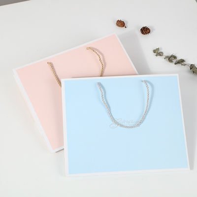 Custom Printed Shopping Bag Cardboard Luxury White Kraft Paper Gift Bag With Ribbon Handle